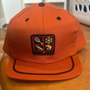 RETRO Burnt‎ orange snap back hat
With sports 4x4 sports patch on front.